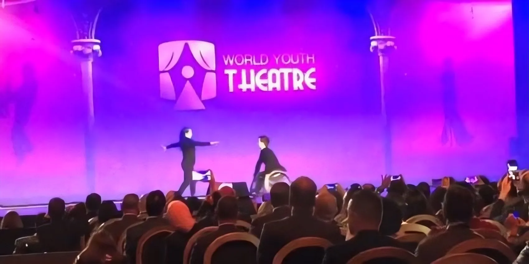 Performers on stage at the World Youth Forum